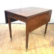 A fine George III mahogany dining table c.1800, of small proportions, the rectangular top above a