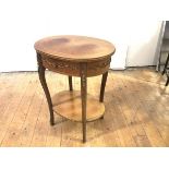 A French kingwood, oak and gilt-metal mounted occasional table, the quarter-veneered top above a