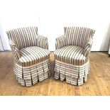A pair of walnut armchairs, early 20th century with pale blue and pink watered silk upholstery,