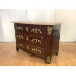 A Louis XVI kingwood and brass mounted commode, the associated marble top above an arrangement of