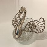 A Continental silver-mounted cut-glass swan-form sweetmeat dish, the pierced wings decorated with