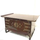A Chinese simulated elm table cabinet, with pagoda top and engraved brass lock plate and hinges.