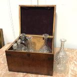 A mid 19thc brass bound rosewood decanter box, the top inset with vacant shield cartouche, enclosing