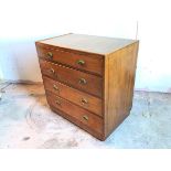 An Edwardian mahogany chest of drawers with raised moulded edge to top, above four graduated