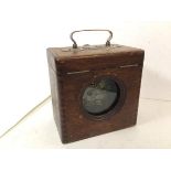 An early 20thc pigeon racing timer in wooden case, handle to top with stamp Belgica (19cm x 12cm x