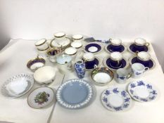 A mixed lot of china including a set of five Aynsley demi tasse cups with gilt laurel decoration,