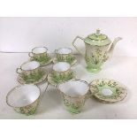 A 1930s Aynsley china coffee set, including three demi tasse cups, six saucers, sugar bowl, milk jug