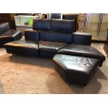 A Rolf Benz sectional sofa with three angular sections, two attachable headrests and footstool,