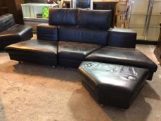 A Rolf Benz sectional sofa with three angular sections, two attachable headrests and footstool,
