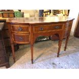 A Wade Furniture reproduction mahogany sideboard with satinwood crossbanding, fitted single frieze