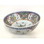 A large modern Chinese famille rose punch bowl, with floral and butterfly decoration (18cm x 40cm)