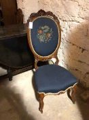 A Victorian mahogany bedroom chair, with large balloon back having a shell and flower carved crest