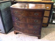 A mahogany Burton Reproductions Ltd. George III style bowfront chest, fitted four drawers, lacking