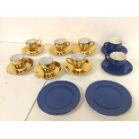 A set of six Royal Worcester demi tasse cups and saucers, with gilt finish, some possibly seconds (