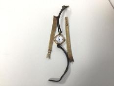 A 9ct gold milanese style watch strap (19.19g) and a 9ct gold lady's wristwatch, with enamelled dial