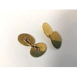 A pair of 9ct gold oval sleevelinks, unengraved (combined: 6.09g)