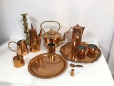 An assortment of copper and brass including a Swedish Ystad- metall coffee pot with copper