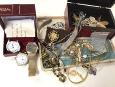 A group of costume jewellery with some silver including necklaces, paste pearls, watches, charms