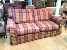 A John Lewis two seater sofa in plaid upholstery with scrolled arms (87cm x 200cm x 95cm)