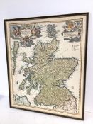 After an early 18thc coloured map of Scotland, the cartouche inscribed Yohann Baptist Homann (61cm x