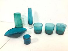 A collection of turquoise and teal glass including three tumblers (8cm x 8cm), a bud vase, a water