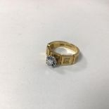 An 18ct gold ring, set single diamond in claw setting (I) (4.23g)