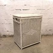 A wicker laundry basket with hinged lid and handles to side, painted white (66cm x 54cm x 39cm)