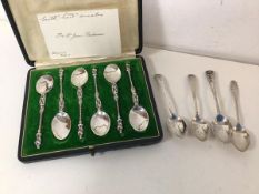 A set of six 1953 Chester silver apostle coffee spoons in original box, and four other silver coffee