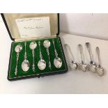 A set of six 1953 Chester silver apostle coffee spoons in original box, and four other silver coffee