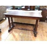 A 19thc mahogany centre table, c.1840, the rectangular top raised on turned columns and a platform