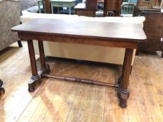A 19thc mahogany centre table, c.1840, the rectangular top raised on turned columns and a platform