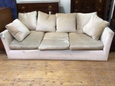 A modern sofa in sand upholstery with down filled cushions, on square supports (70cm x 225cm x