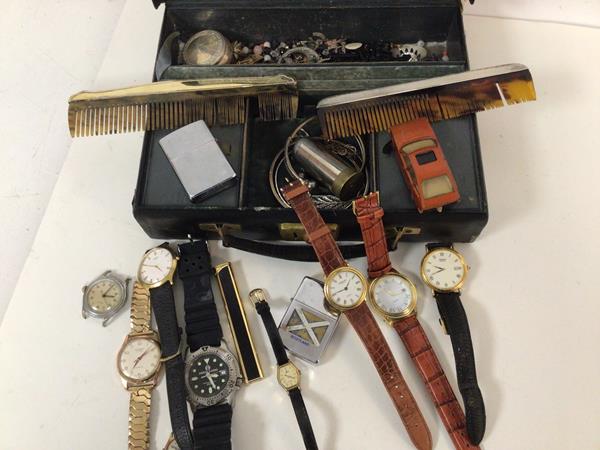 A mixed lot including gentleman's and lady's wristwatches, lighters, silver backed comb and silver