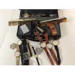 A mixed lot including gentleman's and lady's wristwatches, lighters, silver backed comb and silver
