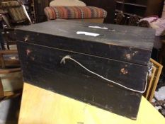 An ebonised pine chest, the hinged top over an unfitted interior (36cm x 74cm x 45cm)