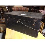 An ebonised pine chest, the hinged top over an unfitted interior (36cm x 74cm x 45cm)