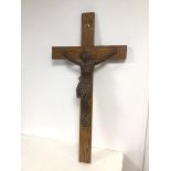 A large oak crucifix with a spelter scuplture of Christ on the Cross, marked to footrest France A.