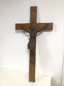 A large oak crucifix with a spelter scuplture of Christ on the Cross, marked to footrest France A.