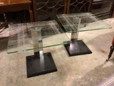 A pair of modern lamp tables with square etched glass tops on triangular mirrored stems and square