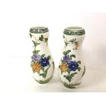 A pair of vases of double gourd form with foliate decoration, both marked Liberty London to base and