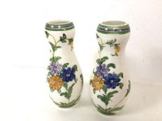 A pair of vases of double gourd form with foliate decoration, both marked Liberty London to base and