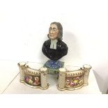 A 19thc. ceramic bust of the Reverend Wesley, on footed base, some losses and damage (29cm) and a