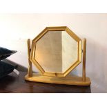 A pine octagonal dressing table mirror with a moulded frame (51cm x 60cm x 12cm)