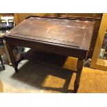 An early 20thc mahogany drafting table, the hinged sloped front over an arrangement of pigeonholes