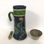 An Aesthetic movement stoneware glazed water jug (losses, handle a/f) (31cm) and a Studio Pottery