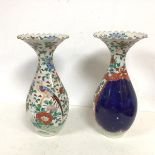 A pair of late 19thc Japanese vases with flared ruffled rim above pear shaped body, losses to gilt