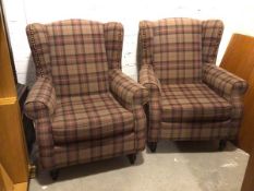 A pair of Next Furniture wing back armchairs, with scroll arms on turned front supports and in a