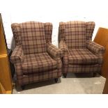 A pair of Next Furniture wing back armchairs, with scroll arms on turned front supports and in a