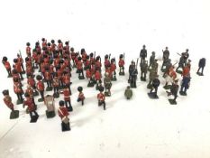 A collection of tin soliders, mostly British, some losses and damage