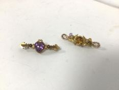 A 15ct gold bar brooch with heart cut amethyst (4.5cm) and another yellow metal bar brooch with